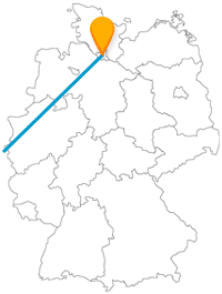 Eine Statue aus Bronze, Fressgasse, Zeitreise oder Gruselprogramm, die Fernbusfahrt zwischen Brüssel und Hamburg lässt nichts zu wünschen übrig.